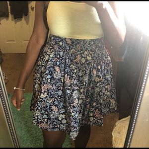 A multi-colored Old Navy skirt with pockets.